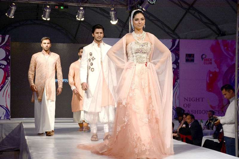 Models present creations by designer Sobia during a fashion show in Islamabad, capital of Pakistan.