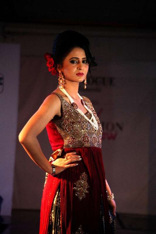 A model presents a creation by designer Hameeda at a local hotel in Islamabad, capital of Pakistan
