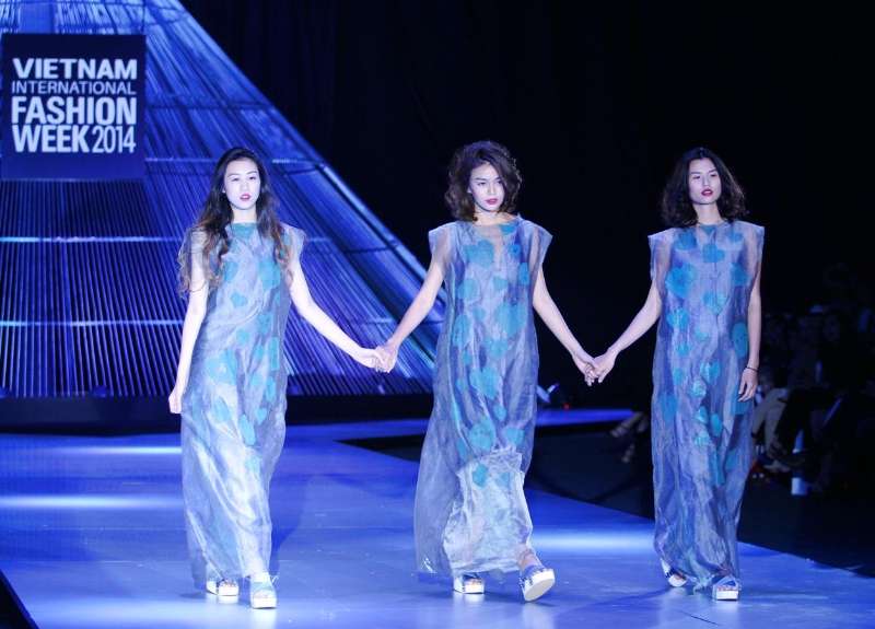 Models present creations of Vietnamese designer Li Lam during the Vietnam International Fashion Week 2014 in Ho Chi Minh city, Vietnam