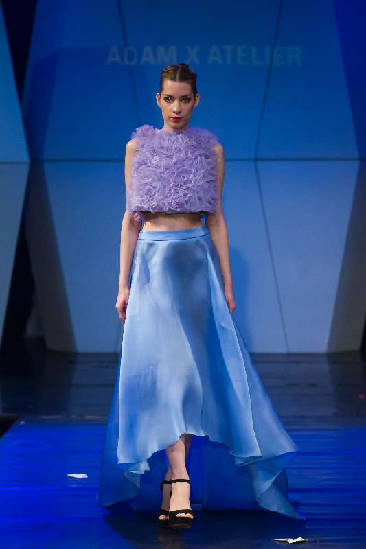 A model presents a creation by British designer Adam X Atelier during the Budapest Fashion Week in Budapest, Hungary