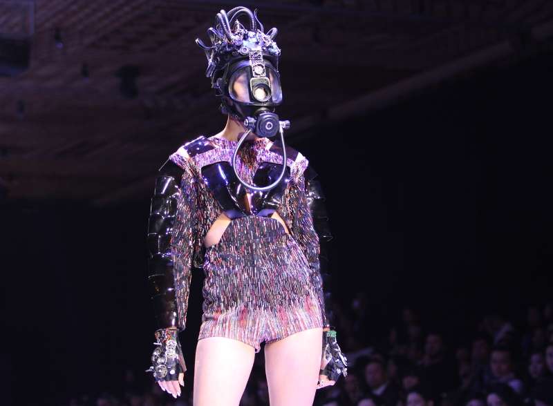 A model presents creations of Vietnamese designer Nguyen Cong Tri during the Vietnam International Fashion Week 2014 in Ho Chi Minh city, Vietnam