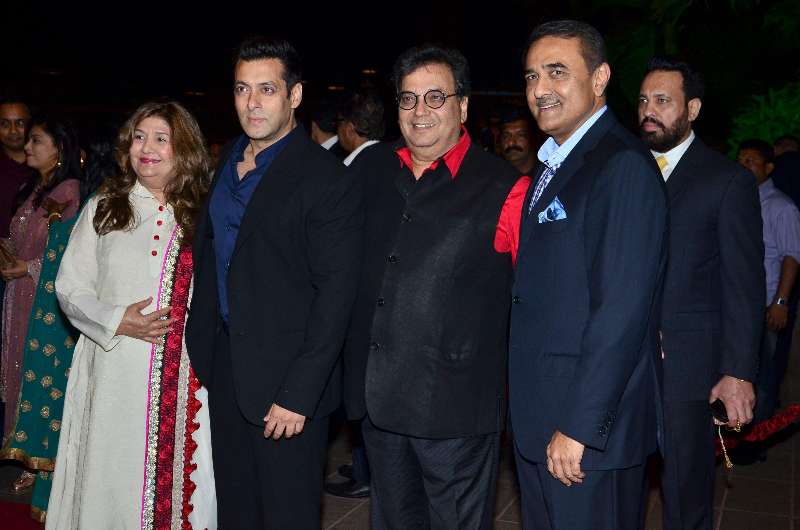 Mumbai: Actor Salman Khan with filmmaker Subhash Ghai and Nationalist Congress Party leader Praful Patel during Arpita Khan's marriage reception in Mumbai on November 21, 2014. (Photo: IANS)