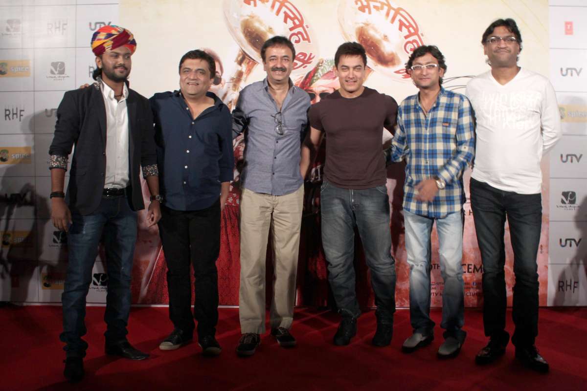 Actor Aamir Khan and filmmaker Rajkumar Hirani with star cast members of film `PK` during a press conference ,in Noida  (File)