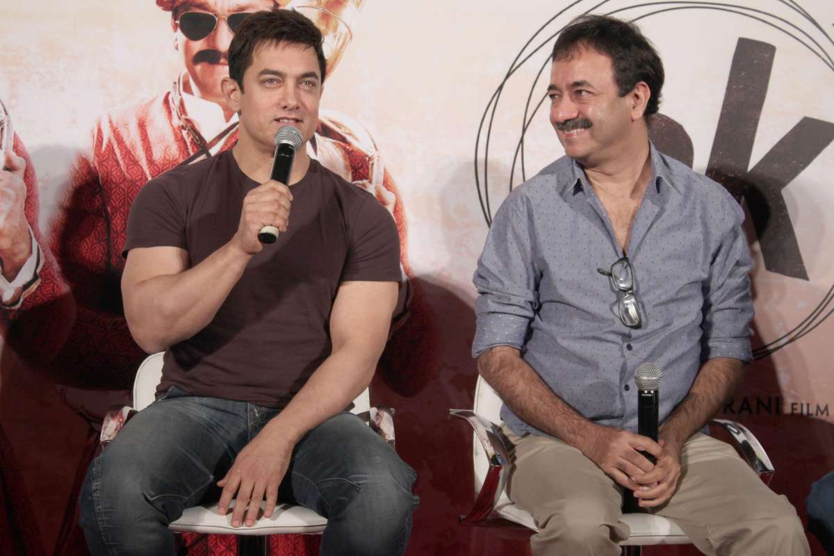 Noida: Actor Aamir Khan and filmmaker Rajkumar Hirani during a press conference ,in Noida on Nov. 8, 2014. (Photo: Amlan Paliwal/IANS)