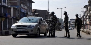 Anantnag: Security personnel enforce curfew imposed by authorities in Anantnag of Jammu and Kashmir on Sept 23, 2016. (Photo: IANS)