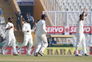 Mohali: Indian captain Virat Kohli and bowler Umesh Yadav celebrates the dismissal of England's Haseeb Hameed on the first day of their third cricket test match in Mohali on Nov. 26,  2016. (Photo: Surjeet Yadav/IANS)