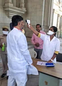 Bengaluru: Karnataka Congress President D. K. Shivakumar being screened for COVID-19 as he arrives at Vidhana Soudha to attend an All Party meeting, on Day 5 of the 21-day countrywide lockdown imposed to contain the spread of novel coronavirus, in Bengaluru on March 29, 2020. (Photo: IANS)