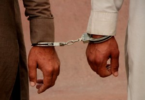 (170326) -- JALALABAD, March 26,2017 (Xinhua) -- Drug smugglers stand handcuffed after being captured during an operation in Nangarhar province, Afghanistan, March 26,2017. Afghan security force members have seized 219 kg drugs and detained eight suspected smugglers during a military operation in Nangarhar province, eastern Afghanistan, a local official said on Sunday.(Xinhua/Rahman Safi)(gl)