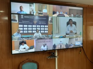 HRD minister through video call instruct IITs to research on COVID-19.