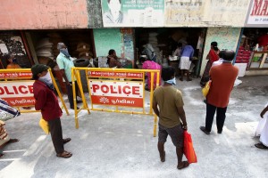 Chennai: People queue up to collect foodgrains at a ration shop during the 21-day nationwide lockdown (that entered the 10th day) imposed as a precautionary measure to contain the spread of coronavirus, in Chennai on Apr 3, 2020. The Tamil Nadu Government had announced Rs 1000 assistance for all ration cardholders in the state from April 2 to 13. (Photo: IANS)