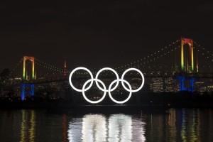 TOKYO, Jan. 24, 2020 (Xinhua) -- Olympic rings are illuminated during an event to mark six months before the opening of the Tokyo 2020 Olympic Games in Tokyo, Japan, on Jan. 24, 2020. (Photo by Christopher Jue/Xinhua/IANS)