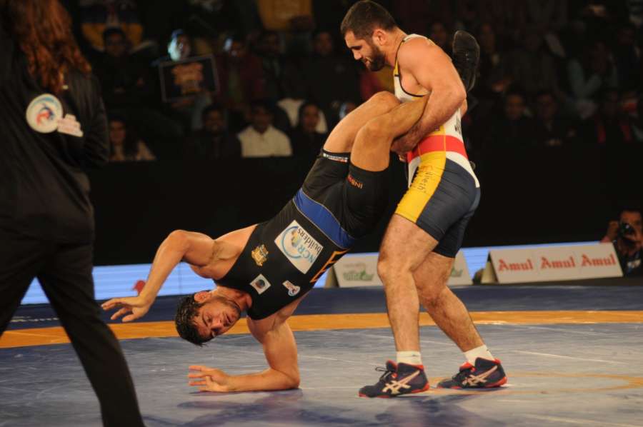 New Delhi: Players in action during a Pro Wrestling League (PWL) semi-final match between NCR Punjab Royals and Mumbai Maharathi at Indira Gandhi Indoor Stadium in New Delhi, on Jan 18, 2017. (Photo: IANS) by . 