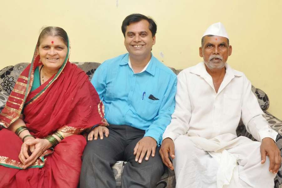 Photos of Dr. Ganesh Rakh, with his parents: mother Sindhu & father Adinath, at their Pune home