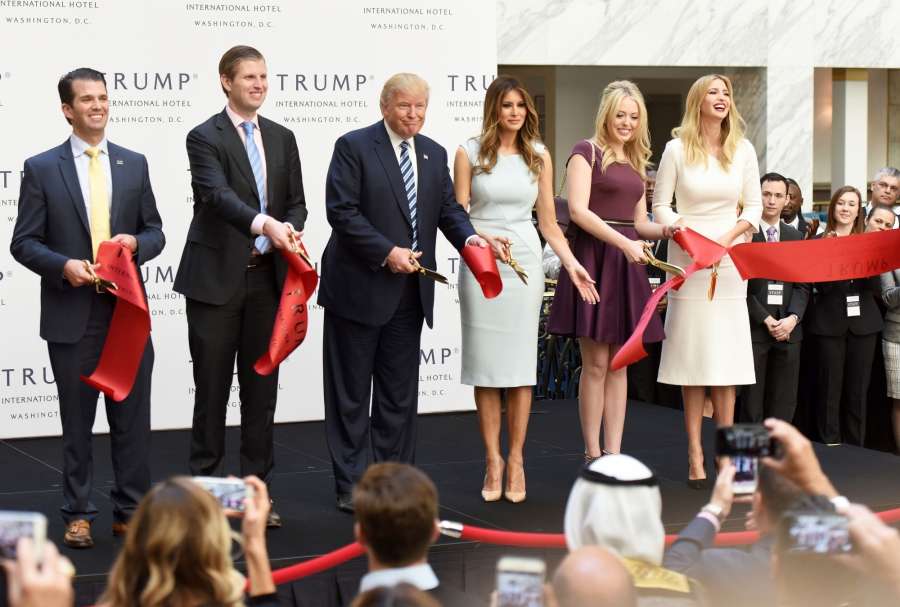WASHINGTON D.C., Oct. 26, 2016 (Xinhua) -- U.S. Republican presidential nominee Donald Trump (3rd L) and his family members cut the ribbon during the opening and ribbon cutting ceremony of Trump International Hotel in Washington, D.C., the United States on Oct. 26, 2016. (Xinhua/Yin Bogu/IANS)