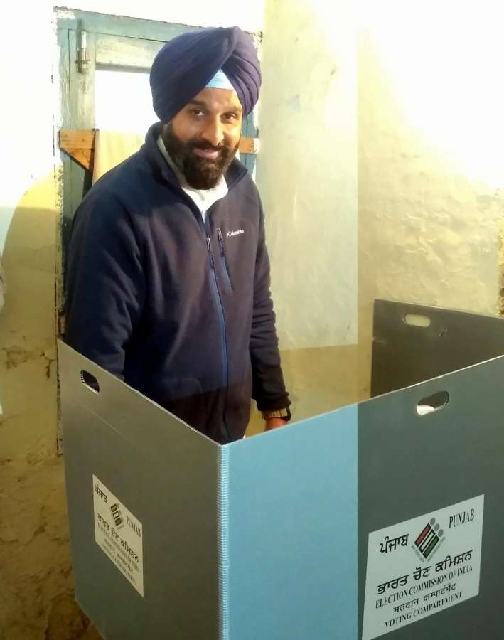 Amritsar: Shiromani Akali Dal (SAD) candidate Bikram Singh Majithia casting his vote at a polling booth during Punjab Legislative Assembly polls in Amritsar, on Feb 4, 2017. (Photo: IANS) by . 