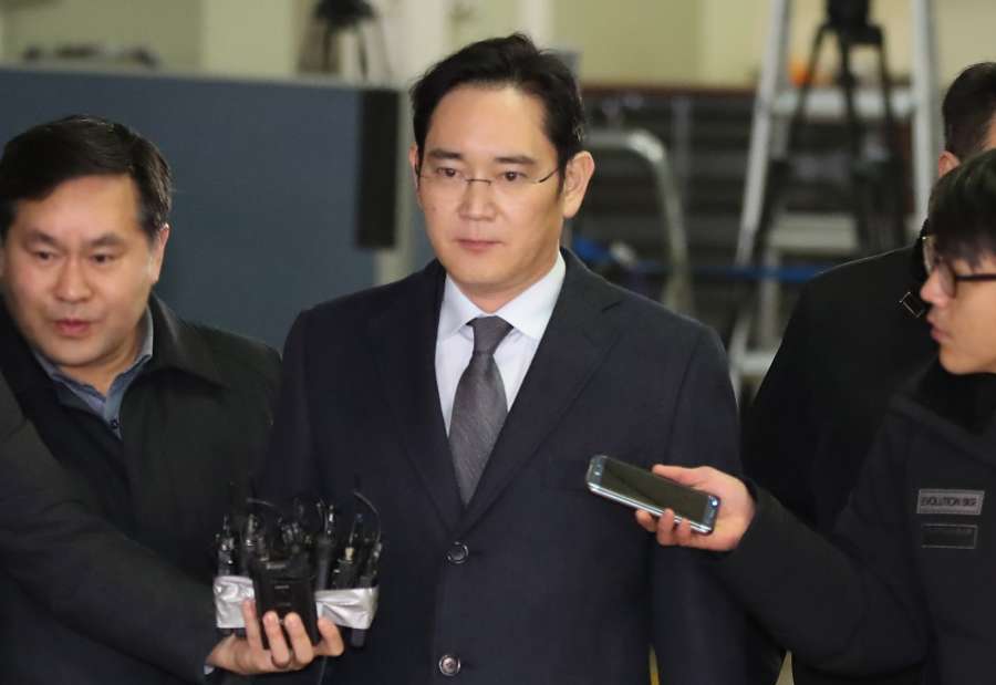 Seoul: Samsung chief at prosecutor's office Lee Jae-yong, vice chairman of Samsung Electronics Co., gets out of the special prosecutor's office in Seoul on Feb. 14, 2017, after concluding questioning over alleged bribery involving impeached President Park Geun-hye. It is the second time he was summoned to the prosecutors' office over alleged bribery related to the merger of two of Samsung's affiliates in 2015. (Yonhap/IANS) by . 