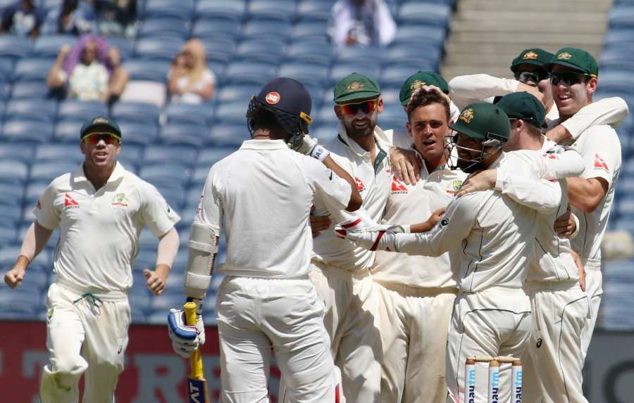 Pune: Australian bowler Steve O'Keefe celebrateswith teammates the wicket of Ajinkya Rahane of India during the second day of the first test match between India and Australia at Maharashtra Cricket Association Stadium in Pune on Feb 24, 2017. (Photo: Surjeet Yadav/IANS) by .