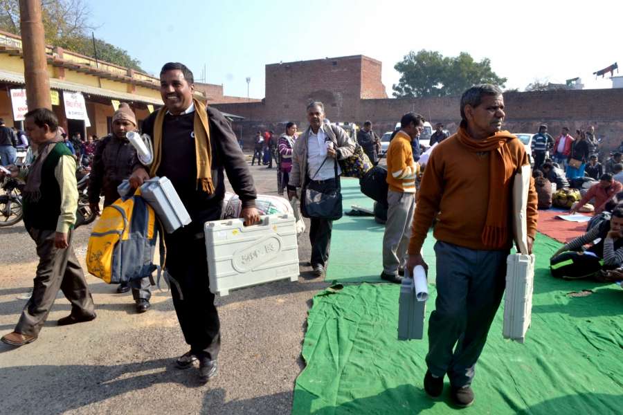 Agra: Poll personnel leave for their respective polling booths with EVMs from Agra ahead of the Uttar Pradesh Assembly Polls on Feb 10, 2017. (Photo: Pawan Sharma/IANS) by .
