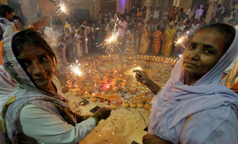 Vrindavan: Widows celebrate Diwali at Radha Krishna temple in Vrindavan of Uttar Pradesh's Mathura district on Oct 27, 2016. (Photo: IANS) by . 