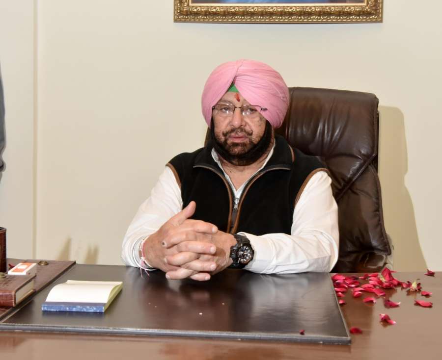 Chandigarh: Captain Amarinder Singh takes charge as the Punjab Chief Minister in Chandigarh on Feb 16, 2017. (Photo: IANS) by . 