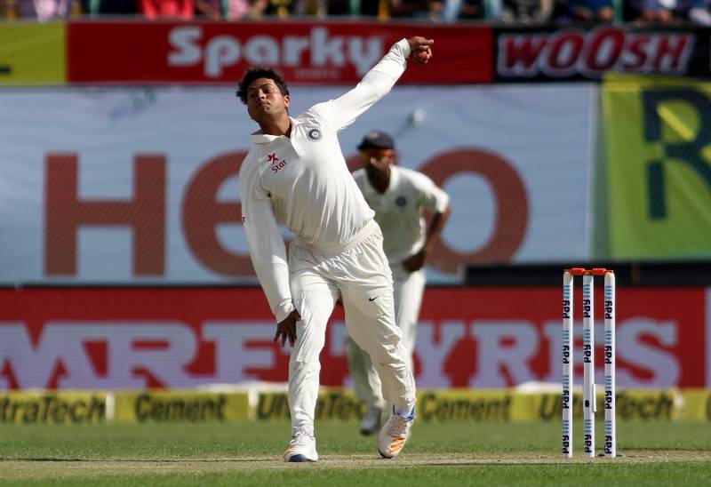Dharamsala: Kuldeep Yadav of India in action on Day-1 of the fourth Test match between India and Australia at Himachal Pradesh Cricket Association Stadium in Dharamsala on March 25, 2017. (Photo: Surjeet Yadav/IANS) by .