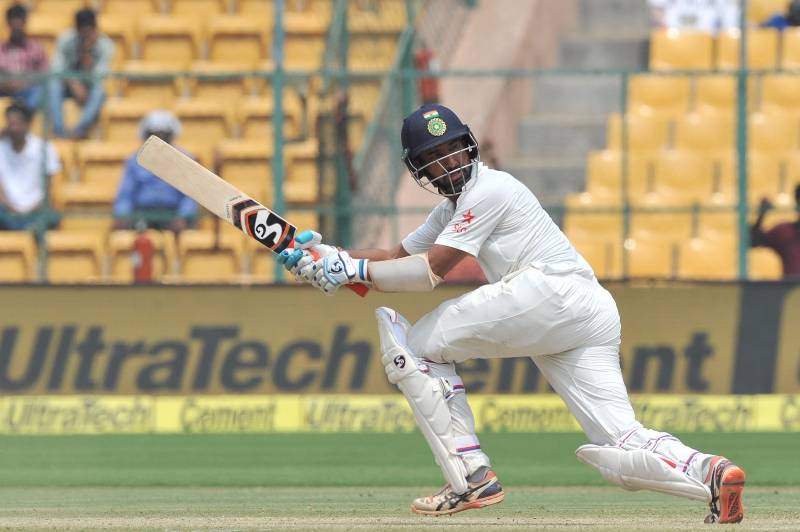 Bengaluru: Cheteshwar Pujara of India in action during the third day of the second test match between India and Australia at M. Chinnaswamy Stadium in Bengaluru on March 6, 2017. (Photo: IANS) by .