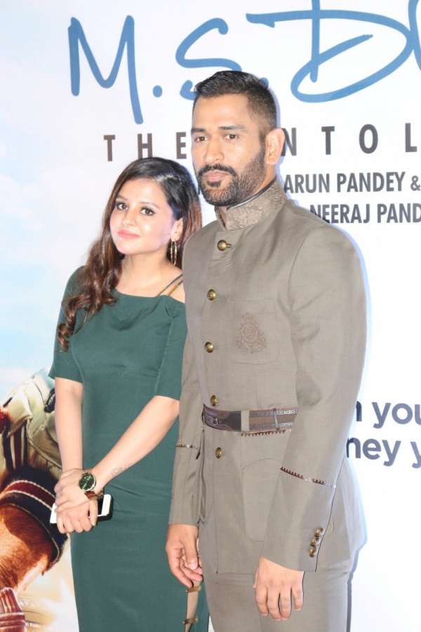 Mumbai: Indian cricket player Mahendra Singh Dhoni along with his wife Sakshi Dhoni during the screening of film M S Dhoni, in Mumbai, on Sept 29, 2016. (Photo: IANS) by . 
