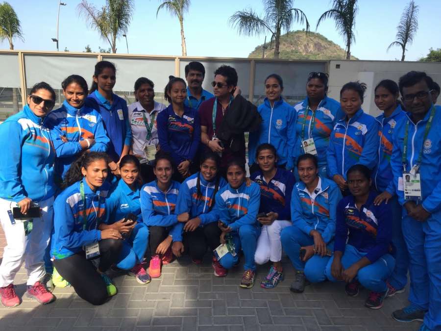 Rio De Janeiro: Former Indian cricketer Sachin Tendulkar with with Indian women hockey player and other athletes at the Games Village in Rio de Janeiro on Aug. 6, 2016. (Photo: V Krishnaswamy/IOA/IANS) by . 