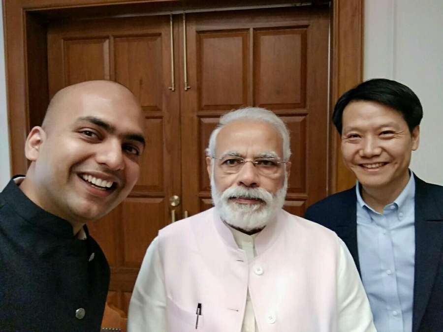 New Delhi: Xiaomi Inc Founder and CEO Lei Jun with Xiaomi India Vice President and MD Manu Jain call on Prime Minister Narendra Modi in New Delhi, on March 28, 2017. (Photo: IANS) by .