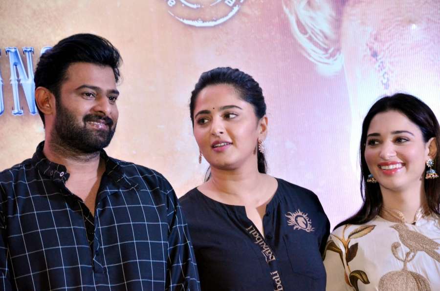 Chennai: Actors Prabhas and Tamannaah Bhatia and Anushka Shetty during press conference regarding film "Baahubali: The Beginning" in Chennai on April 9, 2017. (Photo: IANS) by .