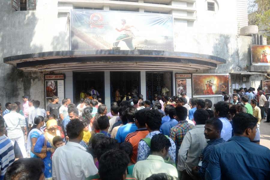 Bengaluru: People throng a cinema hall to watch "Baahubali 2" in ​Bengaluru, on April 28, 2017. (Photo: IANS) by . 