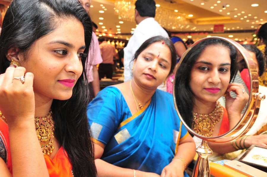 Bengaluru: Women buy gold on "Akshaya Tritiya" in Bengaluru, on May 9, 2016. (Photo: IANS) by . 