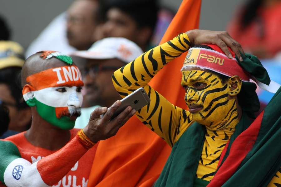 Hyderabad: India and Bangladesh fans at Rajiv Gandhi International Stadium on the second day of the only test match between India and Bangladesh in Hyderabad on Feb. 10, 2017. (Photo: Surjeet Yadav/IANS by . 