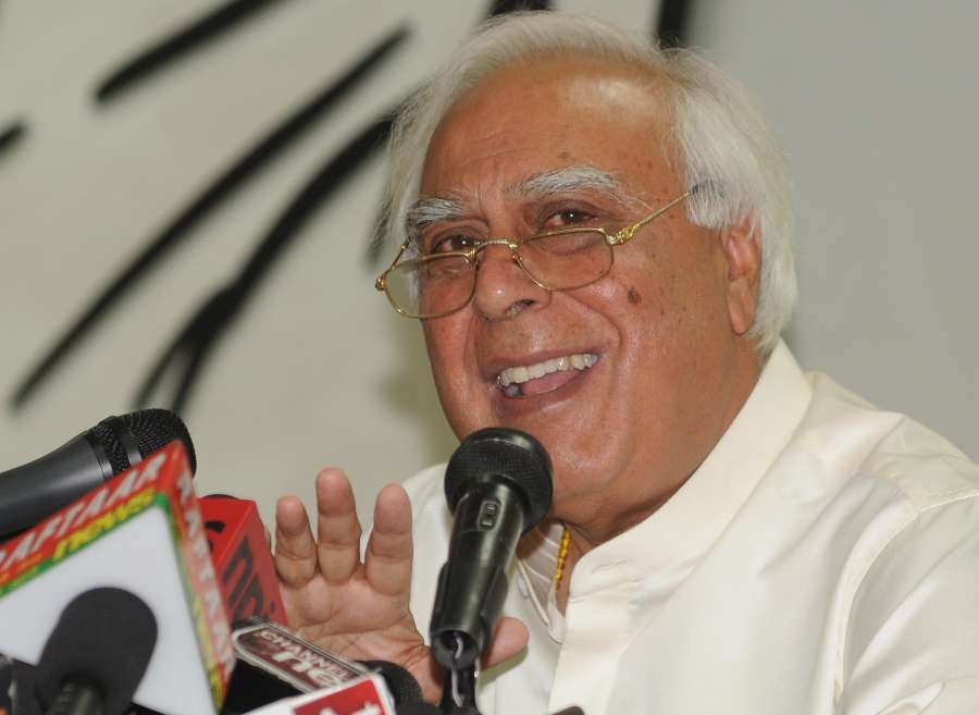 Union Law Minister and Congress leader Kapil Sibal addresses a press conference at AICC office in New Delhi on May 6, 2014. (Photo: IANS) by . 