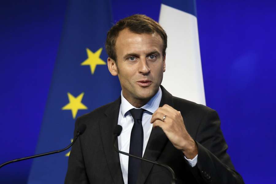 PARIS , Aug. 31, 2016 (Xinhua) -- Emmanuel Macron (L) speaks as he handovers the economy ministry to French Finance Minister Michel Sapin, in Paris, France, Aug. 31, 2016. French Economy Minister Emmanuel Macron on Tuesday handed his resignation to President Francois Hollande "to devote himself to political movement," the presidency office announced on Tuesday. (Xinhua/Thierry Mahe/IANS) by . 
