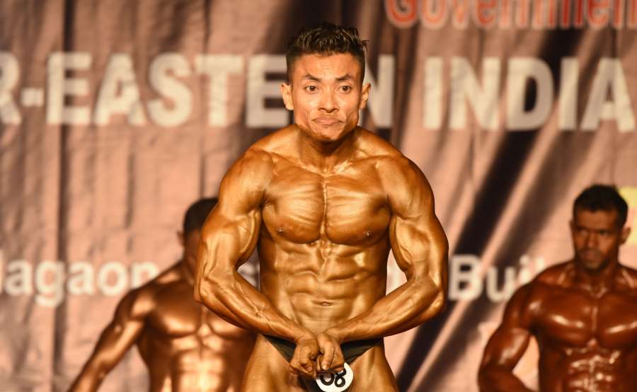Nagaon: A bodybuilder poses during the 7th Eastern India Body Building and Women Fitness Championship in Nagaon on Jan 8, 2016. (Photo: IANS) by . 