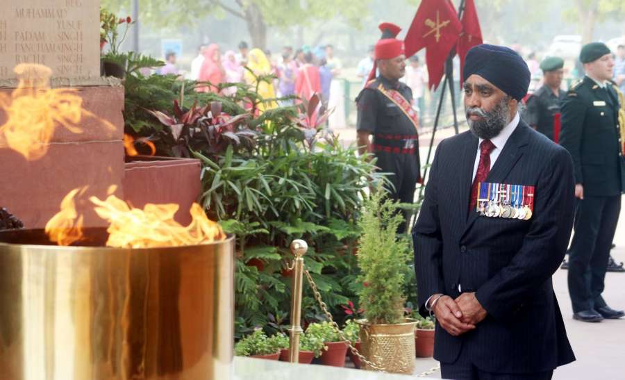 New Delhi: Canadian Defence Minister Harjit Singh Sajjan pays tribute at Amar Jawan Jyoti, India Gate in New Delhi on April 18, 2017. (Photo: IANS) by . 