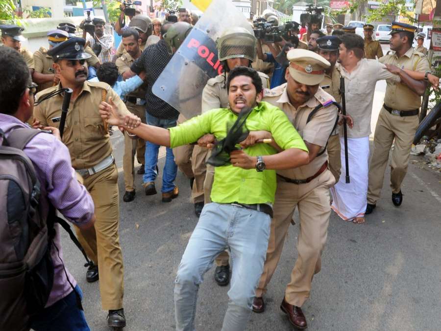 Kochi: Police take away student protesting against police action on parents of Jishnu Pronoy in Kochi on April 9, 2017. Jishnu Pranoy, an 18-year-old engineering student in Thrissur, was found hanging in his hostel in January. (Photo: IANS) by . 