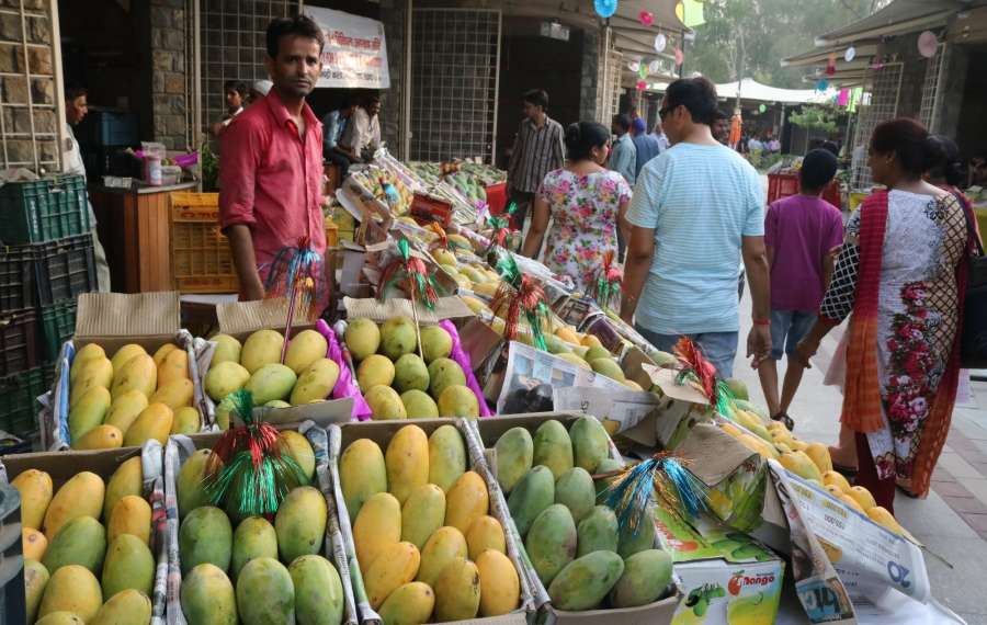 New Delhi: Visitors during the Mango Festival at Dilli Haat in New Delhi on June 24, 2016. (Photo: IANS) by .