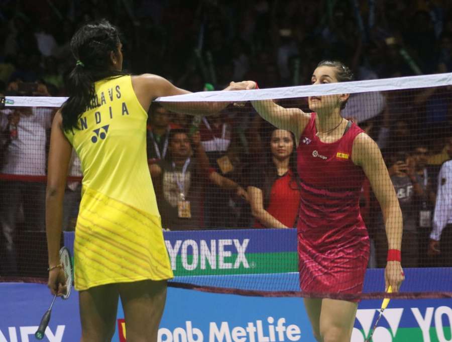 New Delhi: Spanish Shutler Carolina Marin greets P.V.Sindhu of India who won the India Open Superseries badminton title at Siri Fort Sports Complex in New Delhi on April 2, 2017. (Photo: Bidesh Manna/IANS) by . 
