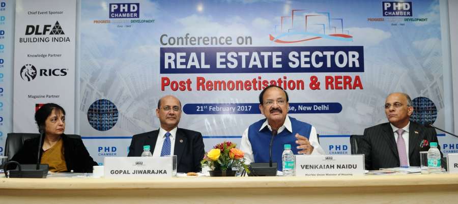 New Delhi: Union Minister for Urban Development, Housing & Urban Poverty Alleviation and Information & Broadcasting M Venkaiah Naidu addresses during a conference on "Real Estate Sector Post Remonetisation and RERA" in New Delhi on Feb 21, 2017. Also seen Secretary, Ministry of Housing and Urban Poverty Alleviation (HUPA), Dr. Nandita Chatterjee and other dignitaries. (Photo: IANS/PIB) by .