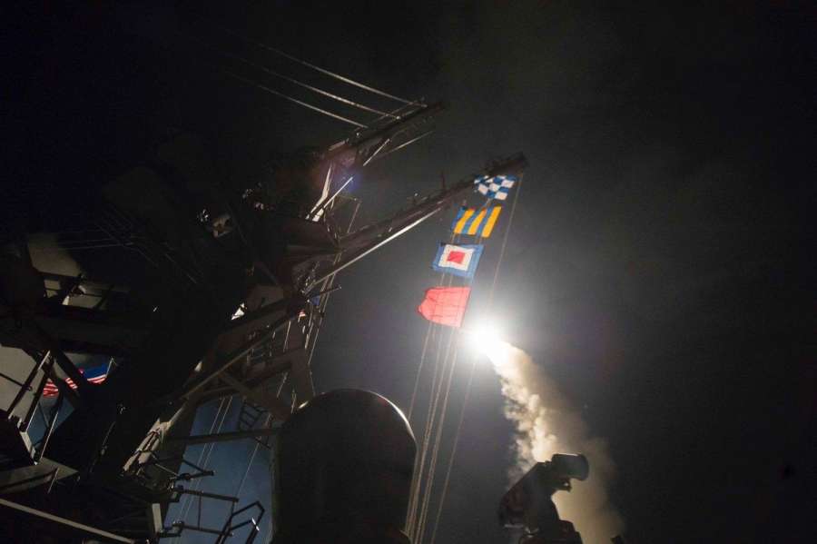 On board USS Porter: US fires Tomahawk Missiles into Syria from USS Porter and USS Ross in retaliation to the Assad regime using nerve agents against its people on April 7, 2017 (Photo Courtesy: US Dept of Defense/Twitter) by . 