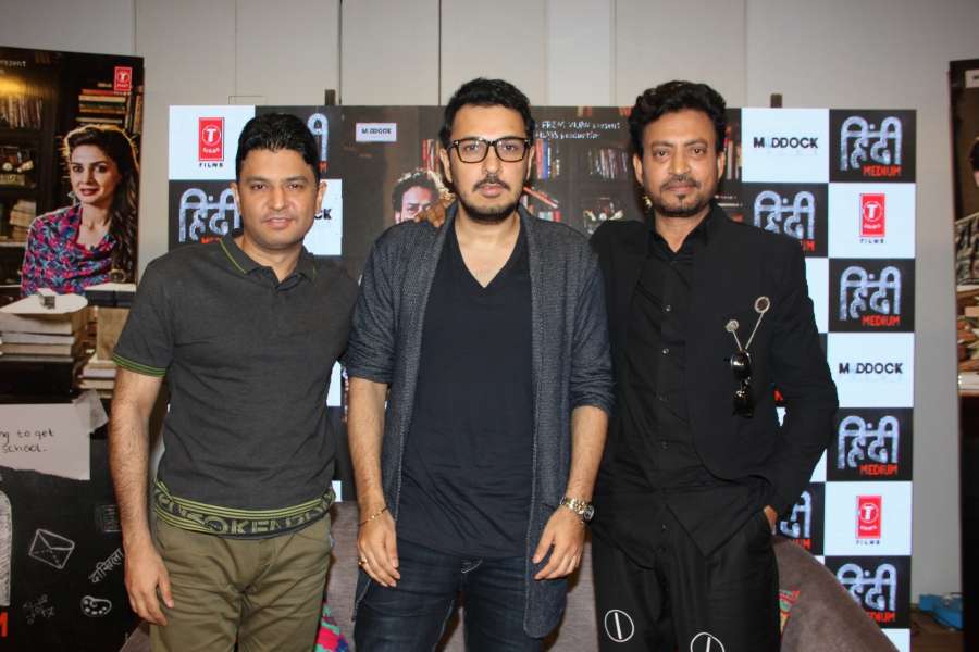 Mumbai: Actor Irrfan Khan ,filmmakers Dinesh Vijan and Bhushan Kumar the trailer launch of film "Hindi Medium" in Mumbai on April 7, 2017. (Photo: IANS) by . 