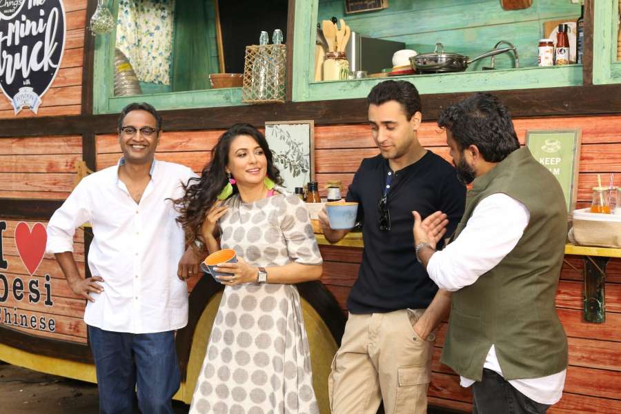 Mumbai: Filmmaker Nikkhil Advani, actors Imran Khan and Mini Mathur during the on location shoot of The Mini Truck food show in Mumbai on April 1, 2017. (Photo: IANS) by .