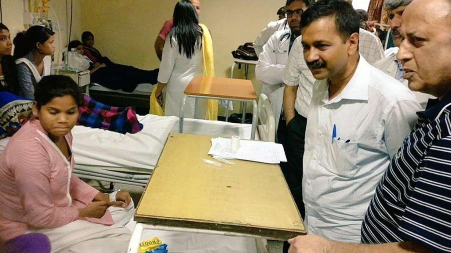 New Delhi: Delhi Chief Minister Arvind Kejriwal talks to the students who fell ill due to gas leak near the school in New Delhi on May 6, 2017. Over 300 students of two girls schools were rushed to hospital on Saturday morning after they complained of dizziness and headache following gas leak from a chemical container near their schools in south Delhi, police said. (Photo: IANS) by .