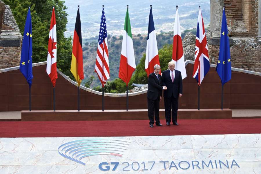 TAORMINA, May 26, 2017 (Xinhua) -- U.S. President Donald Trump (R) shakes hands with Italian Prime Minister Paolo Gentiloni at the ancient Greek theatre of Taormina before the opening ceremony of a G7 Summit, Italy, on May 26, 2017. A two-day summit of leaders from the Group of Seven (G7) industrialized nations kicked off Friday in the Italian town of Taormina. (Xinhua/Jin Yu/IANS)(yk) by .