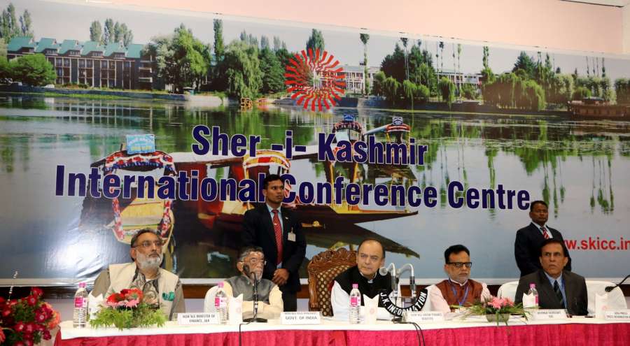 Srinagar: Union Finance Minister Arun Jaitley addresses a press conference after the first day of the GST Council meet.at Sher-e-Kashmir International Convention Centre (SKICC) in Srinagar on May 18, 2017. (Photo: IANS) by . 