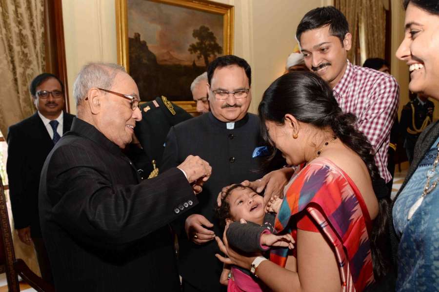 New Delhi: President Pranab Mukherjee launches the Nationwide Polio programme by administering Polio Drops to the Children at Rashtrapati Bhavan in New Delhi on Jan 28, 2016. Also seen Union Health Minister JP Nadd. (Photo: IANS/RB) by . 