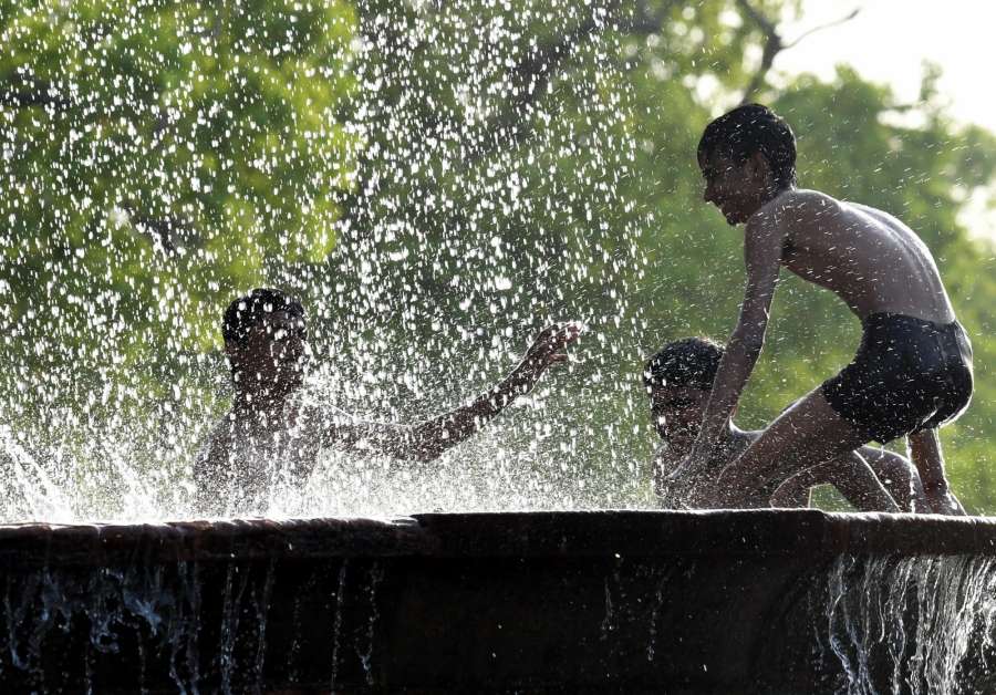 New Delhi: Children beat the heat on a hot day in New Delhi on April 20, 2017. (Photo: IANS) by .