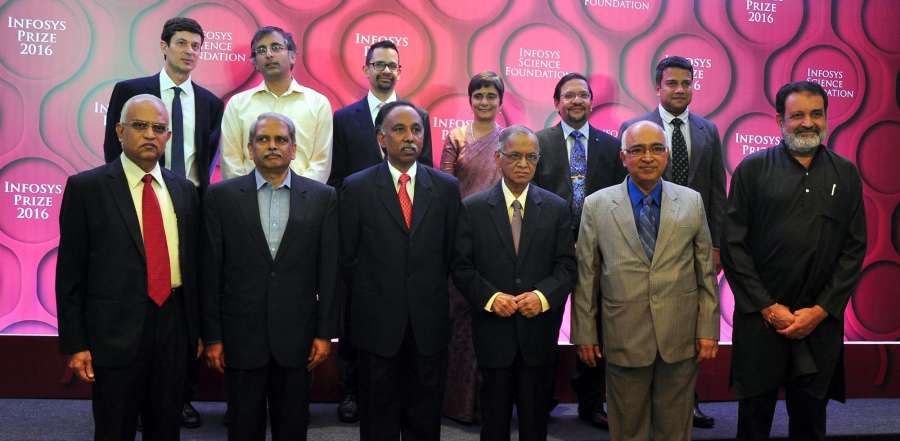 Bengaluru: Infosys founder NR Narayana Murthy, co-founders K. Dinesh, Kris Gopalakrishnan, trustee of the Infosys Science Foundation SD Shibulal, Srinath Batni and Manipal Global Education Chairman TV Mohandas Pai with Kaivan Munshi, Akshay Venkatesh, Gagandeep Kang, Sunil Amrith and V Kumaran who received Infosys Science Foundation award during the award ceremony in Bengaluru on Jan. 7, 2017. Nobel laureates Amartya Sen and Venkatraman Ramakrishnan were also present. (Photo: IANS) by .